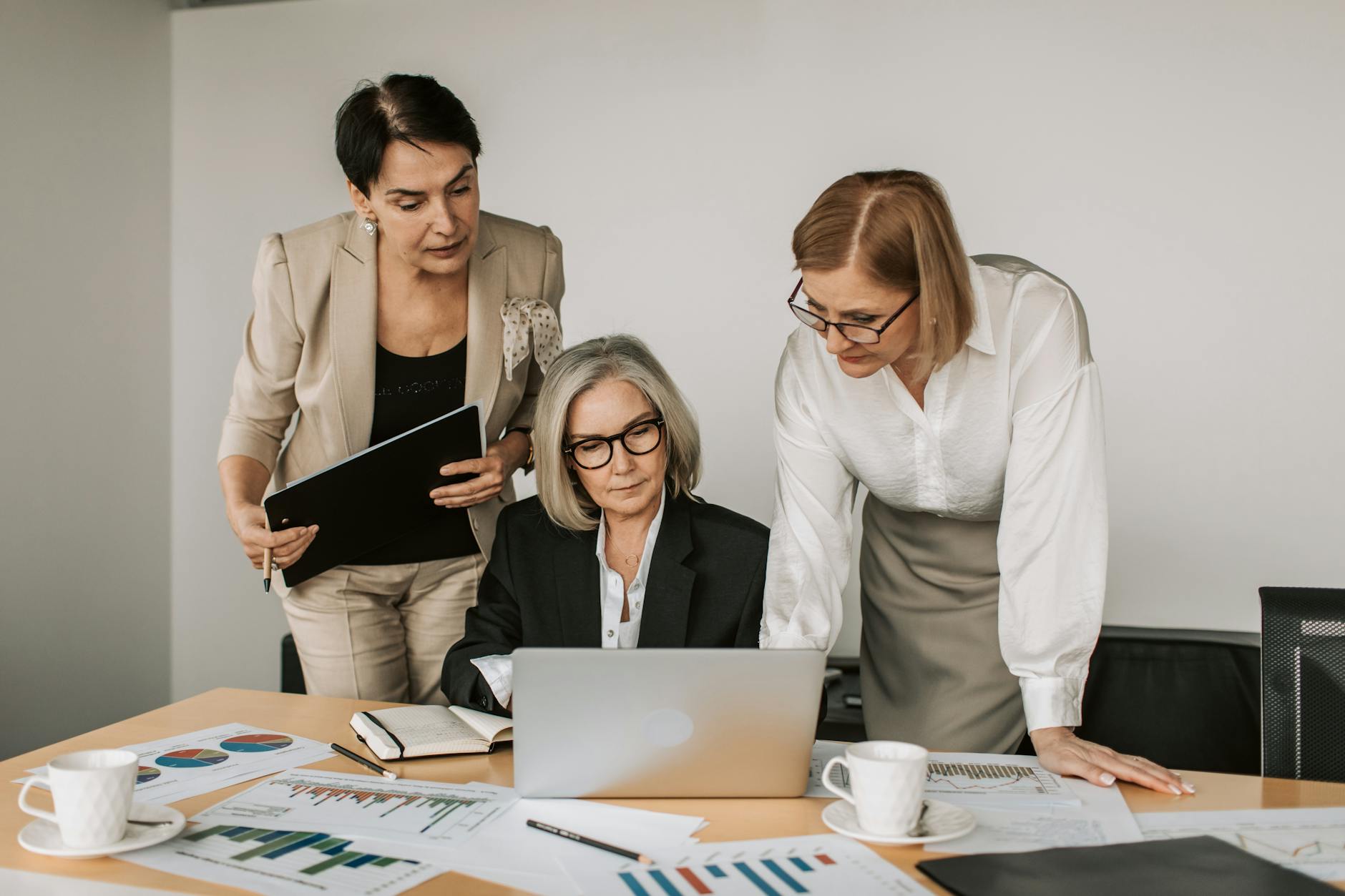 elderly women in a business meeting